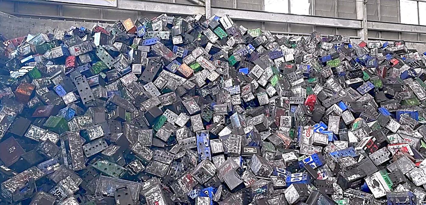 Pile of used lead-acid batteries at the receiving bay